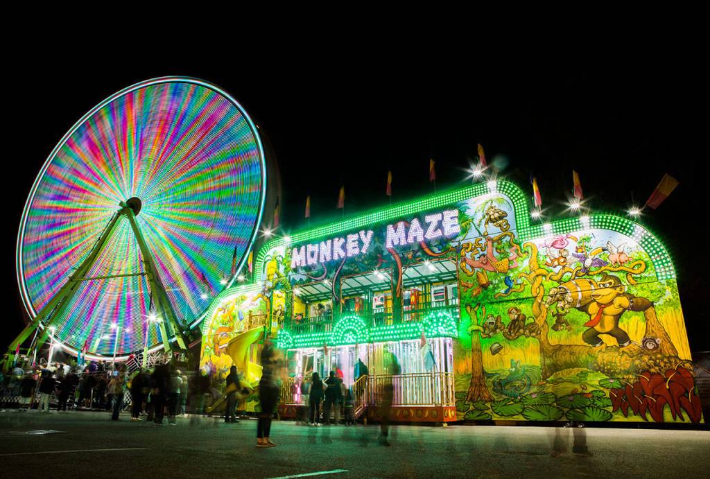 People wait in line for the ferris wheel at the Evergreen State Fair on Sept. 1, 2018 in Monroe, Wa. (Olivia Vanni / The Herald)