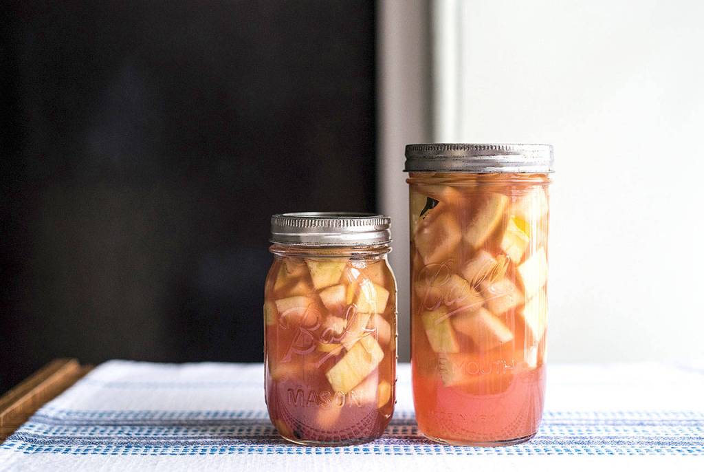 Watermelon rinds are capable of lending a crunchy component to stir-fry or alongside sandwiches in their quick-pickled form, as pictured here. (Grace Dickinson/Philadelphia Inquirer)