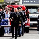 Ken Gaydos, a longtime police and fire department chaplain in south Snohomish County, leads a procession during the 2006 funeral for Charles Chuck Cain, a member of the Edmonds Fire Safety Foundation. Gaydos died Monday. He was 79. (Herald file)