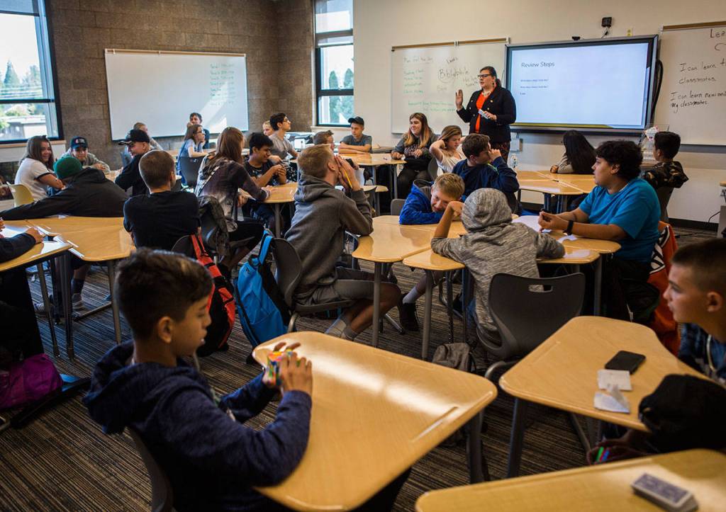 An 8th grade class shares items that mean something to them during school at Park Place Middle School on Thursday in Monroe. (Olivia Vanni / The Herald)