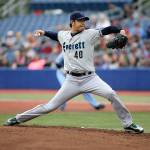 Hisashi Iwakuma pitches for the Everett AquaSox during a game against the Hillsboro Hops on Aug. 26. (Allstar.Photos, Michael & Bill Jacobs)