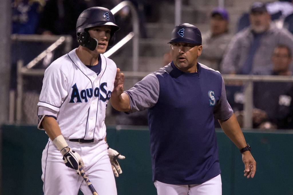 The AquaSoxs Ryan Ramiz protest a call with manager Jose Moreno intervening during Game 1 of the Northwest League North Division Championship Series against Spokane on Sept. 5, 2018, at Everett Memorial Stadium . (Kevin Clark / The Herald)