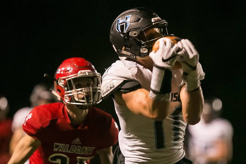 Hockinsons Sawyer Racanelli (right) makes a touchdown reception with Archbishop Murphys Walter Hines defending during a game on Sept. 6, 2018, at Archbishop Murphy High School in Everett. (Kevin Clark / The Herald)