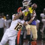 Lincolns Irae Savaiinaea breaks up a pass intended for Lake Stevens Joe Gonzales during a game on Sept. 7, 2018,at Lake Stevens High School. Lake Stevens won 38-21. (Kevin Clark / The Herald)