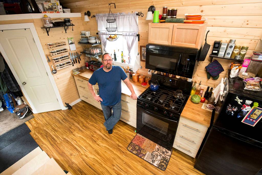 Michael Miller, a chef, had his tiny Everett home built around a full sized kitchen. (Andy Bronson / The Herald)
