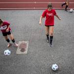 Taylor Khorrami kicks the ball during a touch exercise during practice at Snohomish High School on Sept. 7, 2018 in Snohomish, Wa. (Olivia Vanni / The Herald)