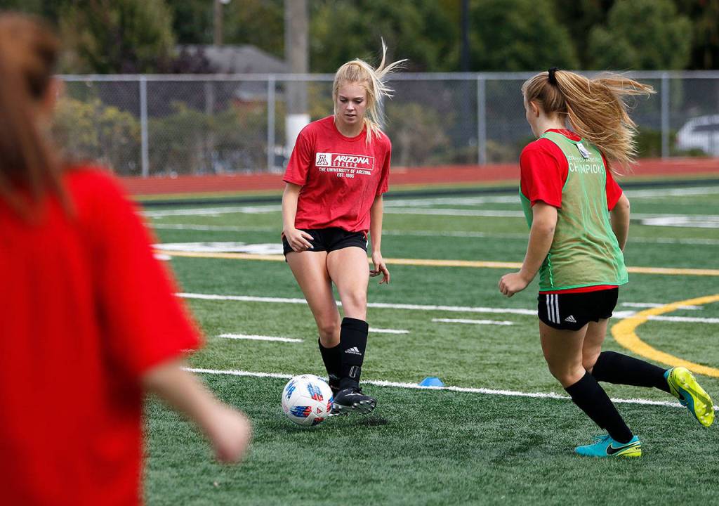 Bree Nichols passes the ball during practice at Snohomish High School on Sept. 7, 2018 in Snohomish, Wa. (Olivia Vanni / The Herald)