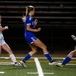 Archbishop Murphys Lexie Klaudt (left) knocks a shot past Liberty goalkeeper Taylor Thatcher (right) for a goal in the second half of the 2A state semifinal game Friday, Nov. 18, 2017, at Shoreline Stadium. Klaudt is expected to lead the Wildcats this season. (Ian Terry / Herald file)