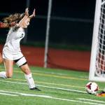 Marysville-Pilchucks Trina Davis, left, figures to play a prominent role for the Tomahawks this season. Here, her shot was saved by Edmonds-Woodway goalkeeper Hannah Hicks (right) as Warriors defender Juliet Hufford (center left) challenges Davis shot during a game Oct. 31, 2017. (Ian Terry / Herald file)