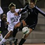 Lake Stevens Sam Foley works to control the ball with Jacksons Gabi Franco closing Nov. 2, 2017, at Goodard Stadium in Everett on. (Kevin Clark / Herald file)