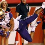 Washington running back Myles Gaskin (9) scores against Utah in the first half of a game on Sept. 15, 2018, in Salt Lake City. (AP Photo/Rick Bowmer)