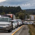 Traffic backs up for miles on I-5 southbound north of the Highway 530 interchange due to a crash that flipped a travel trailer onto its side and across the freeway Sept. 16 in Arlington. (Olivia Vanni / The Herald)