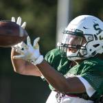 Shorecrest receiver Antonio Stillwell catches the ball during practice Wednesday afternoon at Shorecrest High School in Shoreline. Stillwell leads the Scots big-play passing attack with 382 yards receiving and five touchdown catches through three games. (Kevin Clark / The Herald)