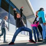 To the delight of the rest of his family, Caleb, 4, spontaneously begins to dance while on a walk near the Everett Yacht Club. Hell turn 5 on Monday. (Dan Bates / The Herald)