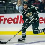 Everetts Sahvan Khaira skates with the puck during the Silvertips 3-1 loss to Vancouver on Saturday in Everett. Khaira, whose older brother also played for the Silvertips, is one of the teams two overage players this season. (Olivia Vanni / The Herald)