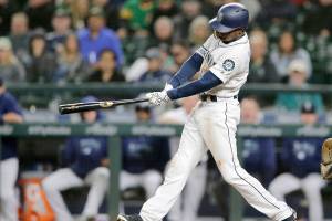 Playoff-bound Athletics beat Mariners 7-3