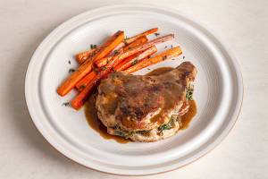 Big, juicy pork chops — stuffed with a flurry of fall flavors