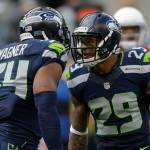 Seahawks safety Earl Thomas (29) and middle linebacker Bobby Wagner react after a play against the Arizona Cardinals during a game in Seattle in 2014. (AP Photo/Stephen Brashear)