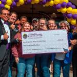 New gym celebrates with donation to Boys & Girls Club