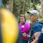 Bridget Wisniewski help leads a class at WTAs Crew Leader College. She was teaching trail work crews about how to build effective drainage, using a trail on Cougar Mountain as an example. (Britt Lê/Washington Trails Association)