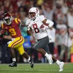 Washington State wide receiver Easop Winston (8) runs toward the end zone past Southern California cornerback Greg Johnson for a touchdown during the first half of a game on Sept. 21, 2018, in Los Angeles. (AP Photo/Jae C. Hong)
