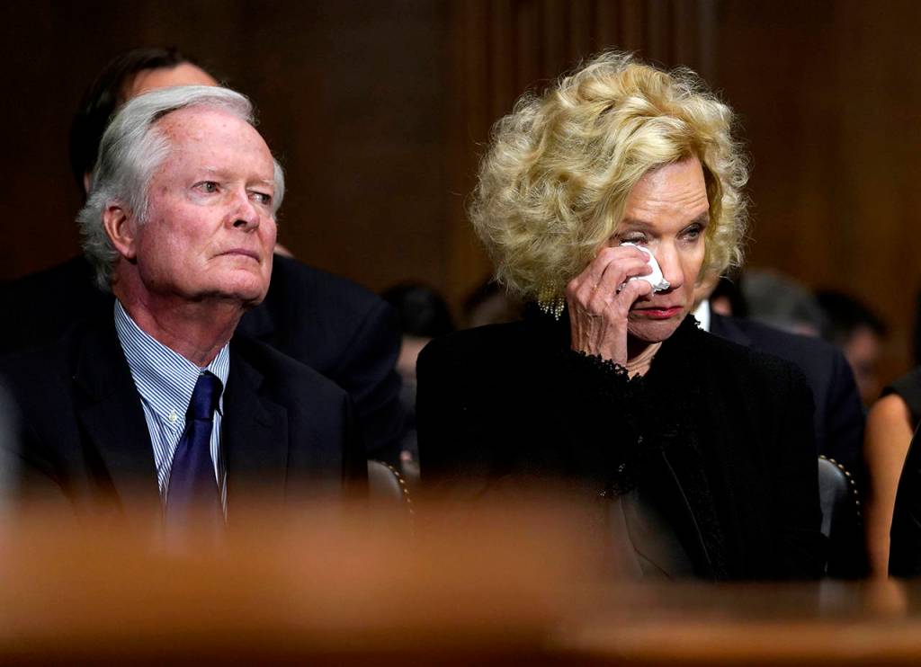 Edward Kavanaugh and his wife, Martha, parents of Supreme court nominee Brett Kavanaugh, listen as he testifies before the Senate Judiciary Committee on Capitol Hill in Washington on Thursday. (AP Photo/Andrew Harnik, Pool)