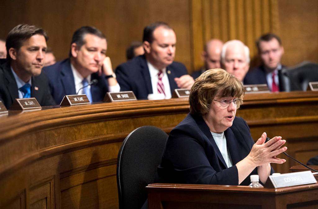 Phoenix prosecutor Rachel Mitchell questions Christine Blasey Ford as Senators, from left, Sen. Ben Sasse, R-Neb., Sen. Ted Cruz, R-Texas, Sen. Mike Lee, R-Utah., and Sen. John Cornyn, R-Texas, listen during the Senate Judiciary Committee hearing, Thursday on Capitol Hill in Washington. (Tom Williams/Pool Image via AP)