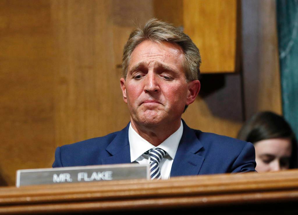 After a flurry of last-minute negotiations, the Senate Judiciary Committee advanced Brett Kavanaughs nomination for the Supreme Court after agreeing to a late call from Sen. Flake for a one week investigation into sexual assault allegation against the high court nominee. (AP Photo/Pablo Martinez Monsivais)
