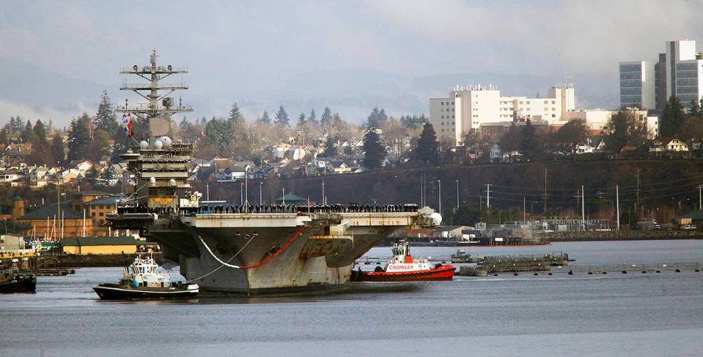 The aircraft carrier USS Nimitz returned to Naval Station Everett on Dec. 16, 2013. (Dan Bates / Herald file)