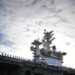 USS Nimitz personnel line the deck of the aircraft carrier as it entered the Port of Everett on Dec. 16, 2013. (Genna Martin / Herald file)