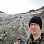 Josh Adams, of Snohomish, near White Chuck Glacier on the morning he captured video of two wolverines in August 2018. (Courtesy of Josh Adams)