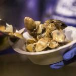 In addition to grilled salmon, luau-goers feasted on steamed clams. (Kevin Clark / The Herald)
