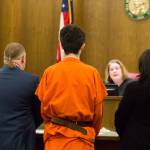 Caya Lenay, of Lynnwood, pleads guilty in the murder of Julie Knechtel, who was killed while trying to defend her son from teenage robbers in 2017, at the Snohomish County Courthouse on Friday in Everett. (Andy Bronson / The Herald)