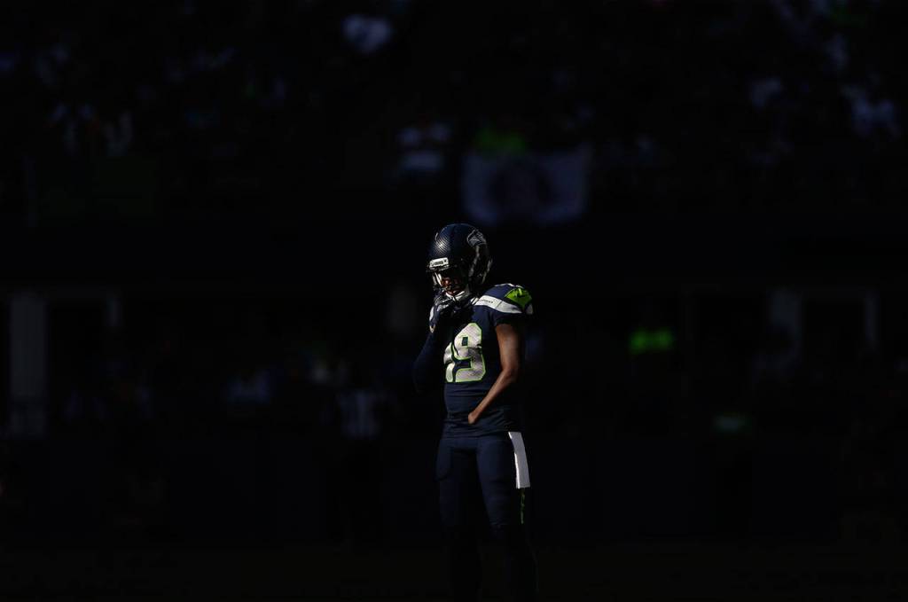 Seahawks Shaquem Griffin adjust his helmet before the snap during the game against the Dallas Cowboys on Sept. 23, 2018 in Seattle, Wa. (Olivia Vanni / The Herald)
