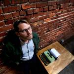 Everett writer Richard Porter has a new book, Smokestackers! The short book is about what he calls the common folklore of Everett. (Dan Bates / The Herald)