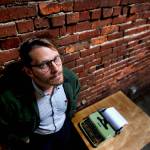 Everett writer Richard Porter has a new book, Smokestackers! The short book is about what he calls the common folklore of Everett. (Dan Bates / The Herald)