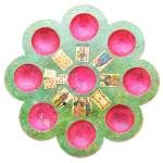 This Pope Joan game board is carved from wood and painted. It sold for $1,007 at a James D. Julia auction in Maine. It is made from a cut-out wooden circle and is 12 1/2 inches in diameter. (Cowles Syndicate Inc.)