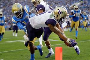No. 10 UW avoids disaster, holds off winless UCLA