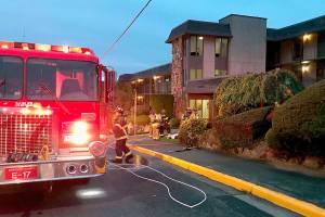 Off-duty fire chaplain helps woman escape from condo flames