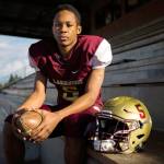 Machai Harris sits in the stands at Lakewood High School on Oct. 10 in Arlington. (Olivia Vanni / The Herald)