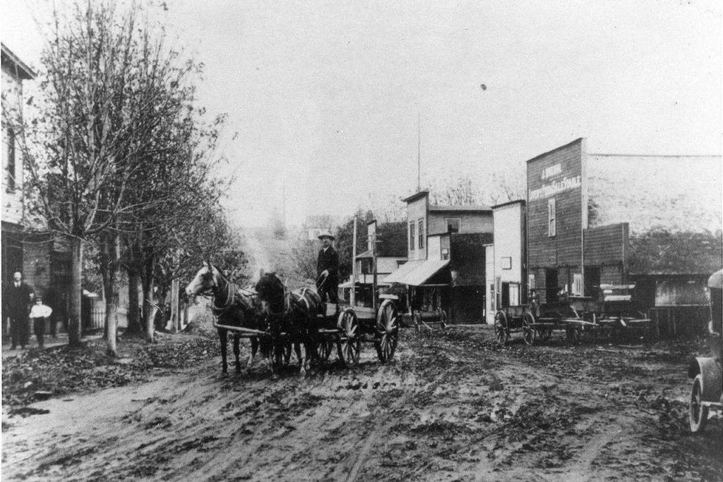 South Whidbey Historical Society offering a History Tour w/ Wine Tasting Oct. 14 as a fundraiser. Provided various old photos of Langley, Clinton, Freeland and members at board meeting.