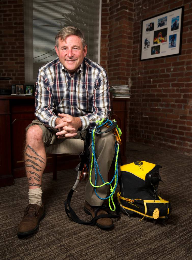  Bellingham resident Dave Mauro has a tattoo on his leg representing each of the highest peak on every continent that he has summited. (Andy Bronson / The Herald)