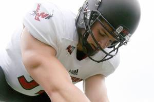 ‘Upside-down quarterback’: Mariner grad shines as long-snapper