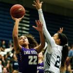 Lake Stevens Raigan Reed (left) goes up for a shot as Glacier Peaks Alexyss Newman (right) defends during a game at Glacier Peak High School in Snohomish on Friday, Jan. 19, 2018. Reed, a junior, has given her verbal commitment to join the Boise State University womens basketball team. (Ian Terry / The Herald)