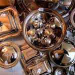 A good selection of vintage silver and other serving items will be sold at the Jackson house. (Dan Bates / The Herald)