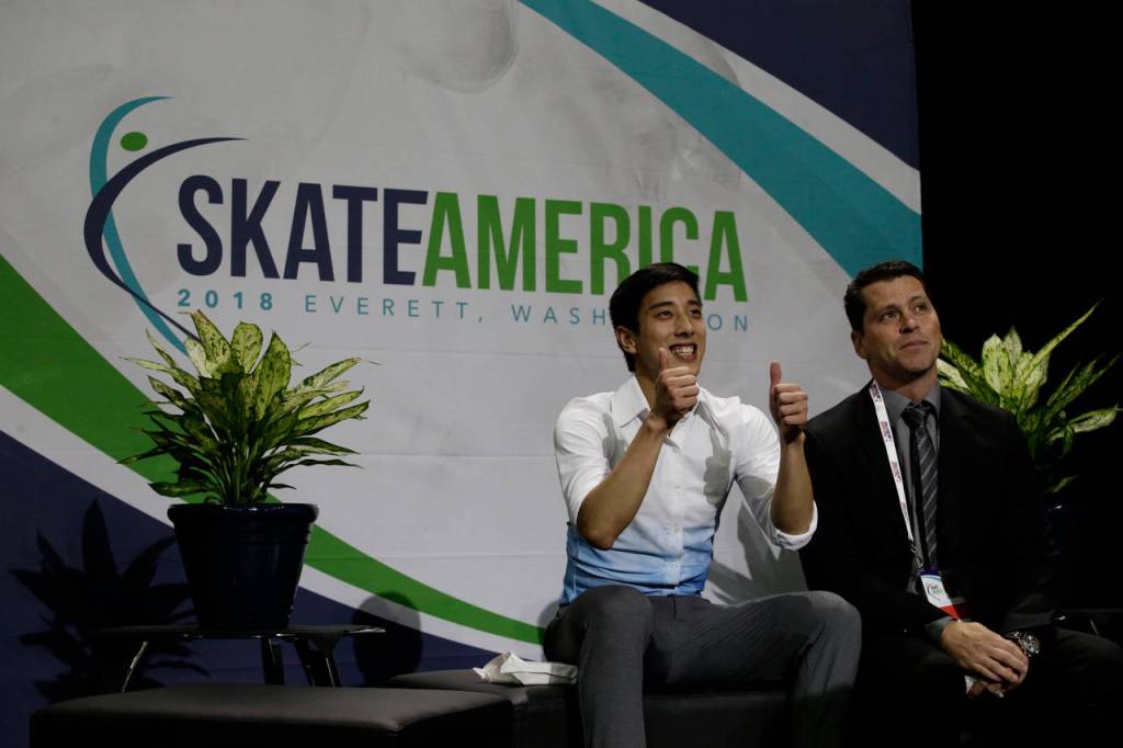 Malaysias Julian Zhi Jie Yee gives two thumbs up as his score in the mens short program announced Friday at the 2018 Skate America competition at Angel of the Winds Arena in Everett. (Andy Bronson / The Herald)