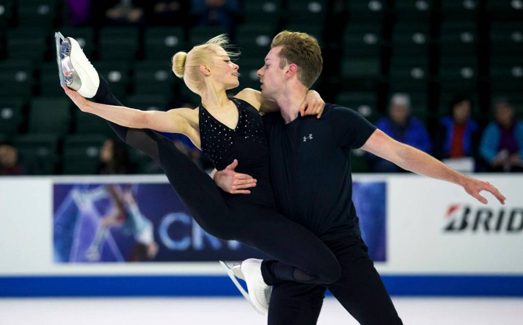 Pairs skaters Nica Digerness and Danny Neudecker (USA) practice before the 2018 Skate America competition in the Angel of the Winds Arena on Oct. 18. (Andy Bronson / The Herald)