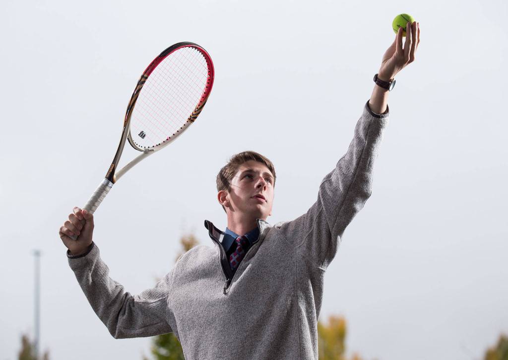 Arlington High School tennis player Ben Spores in Arlington. (Andy Bronson / The Herald)