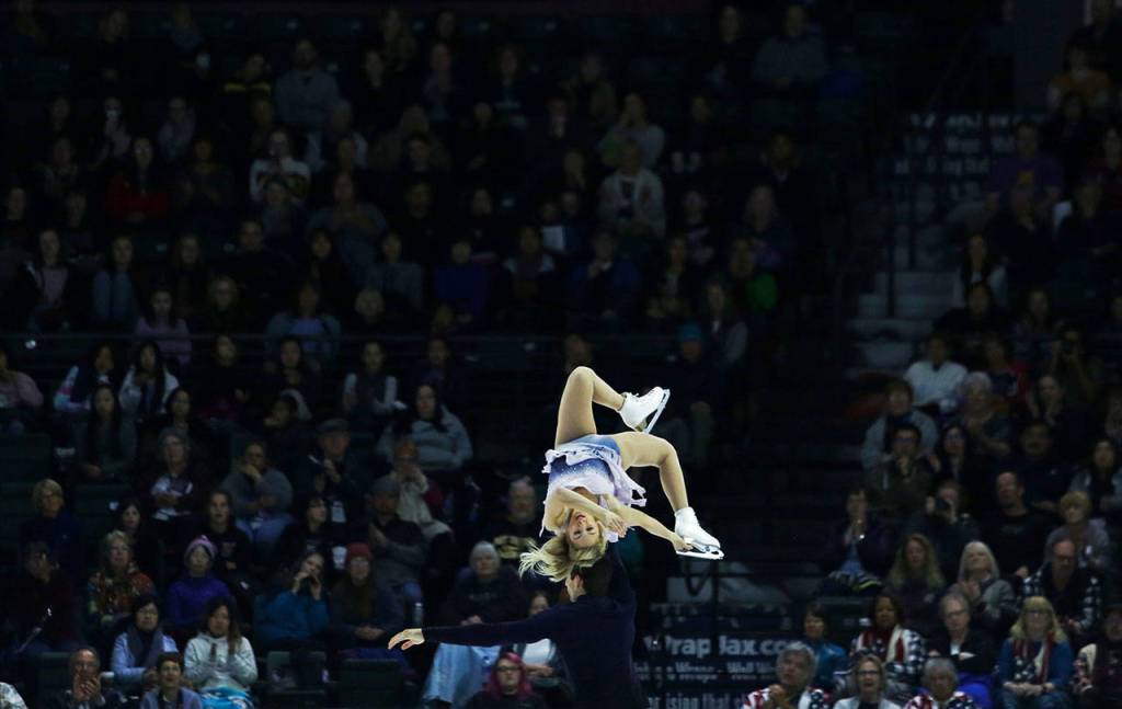 Alexa Scimeca Knierim is lifted by her partner Chris Knierim during their pairs free skating program at the 2018 Skate America competition on Saturday at Angel of the Winds Arena in Everett. (Olivia Vanni / The Herald)