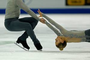 Ashley Cain is spun by her partner Timothy Leduc during the paris free skating program at the 2018 Skate America competition on Saturday at Angel of the Winds Arena in Everett. (Olivia Vanni / The Herald)